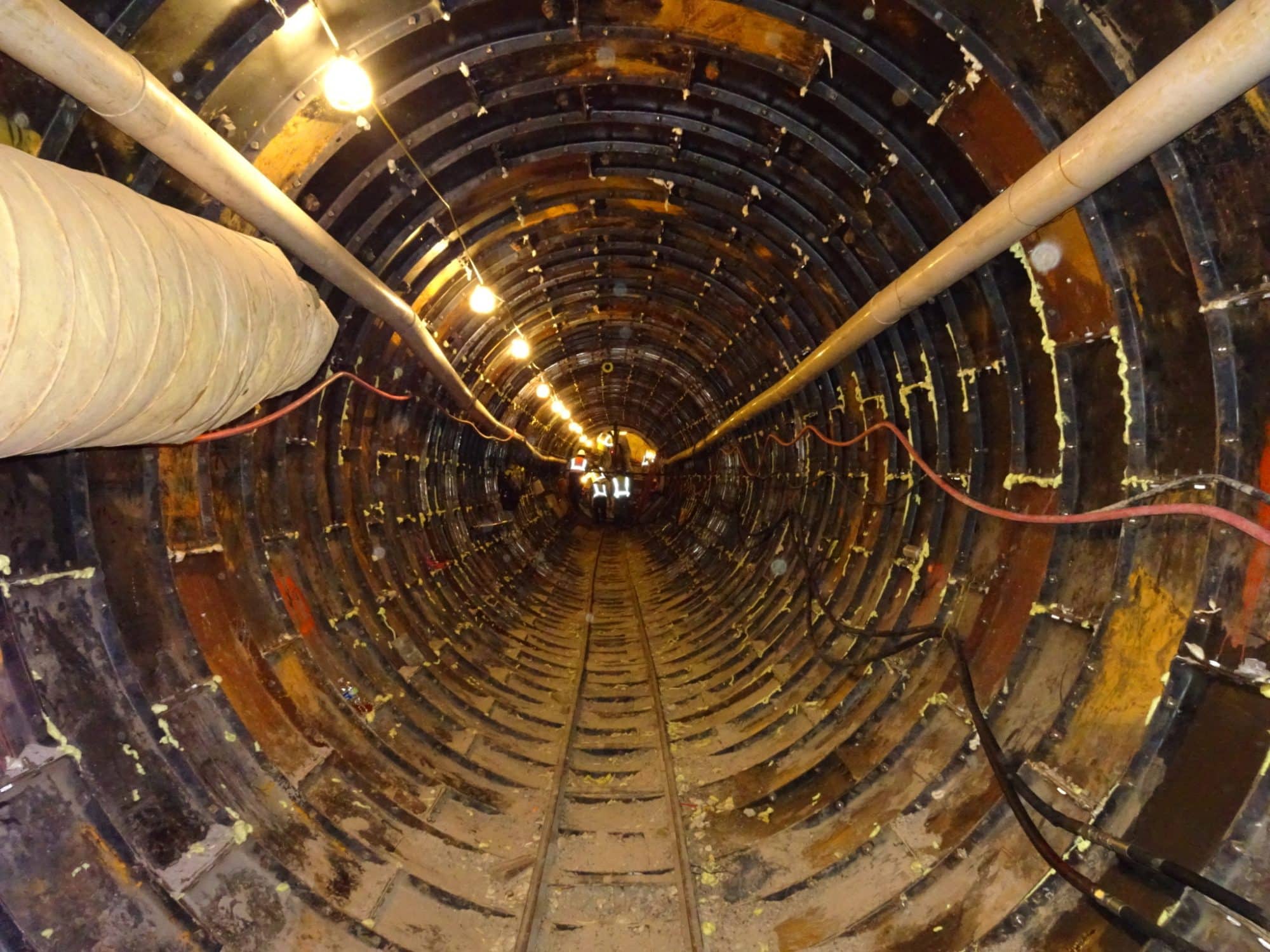 A nine foot diameter tunnel for water that will flow under W. Lake